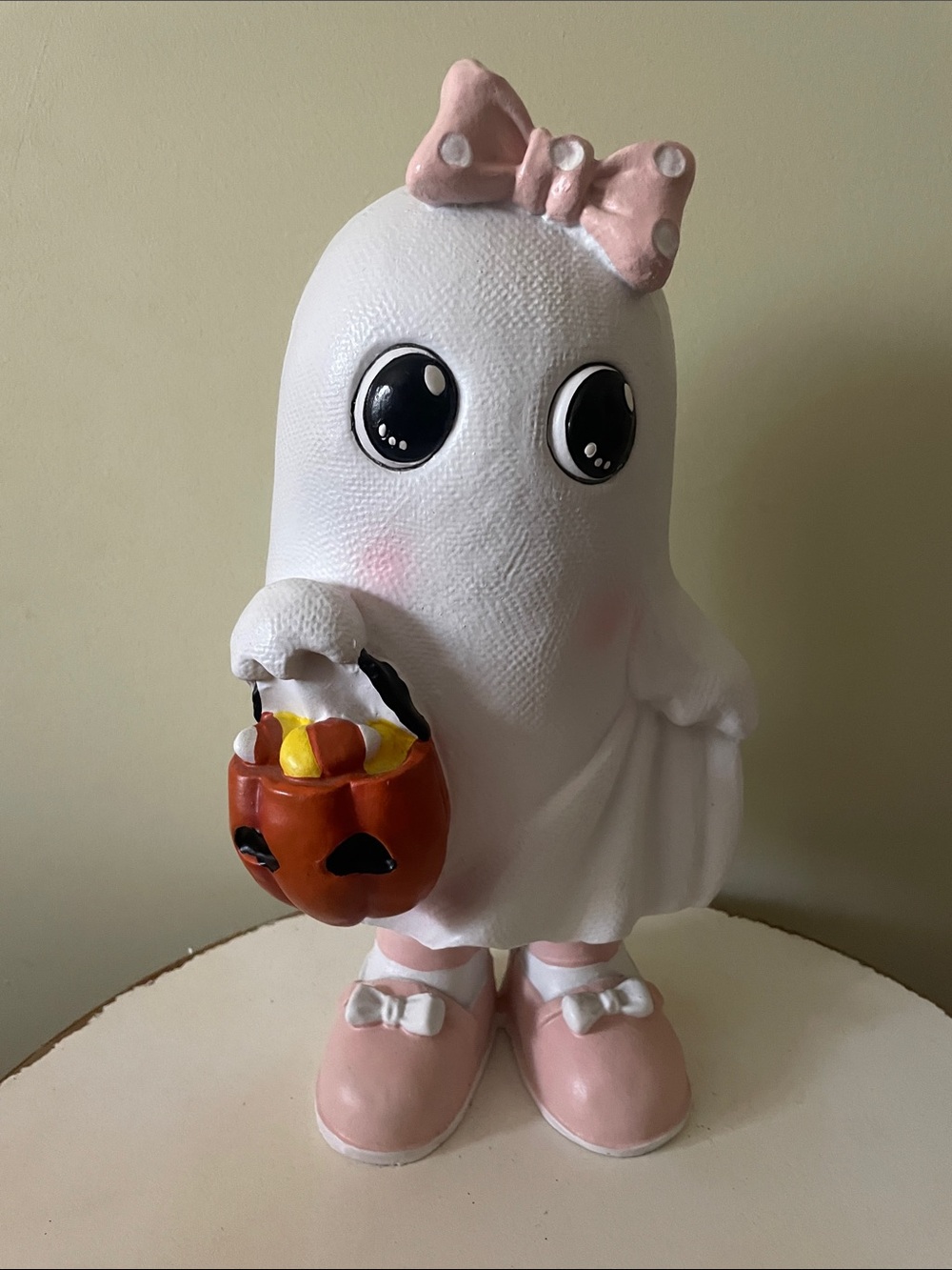 Halloween Pink bow ghost girl holding pumpkin